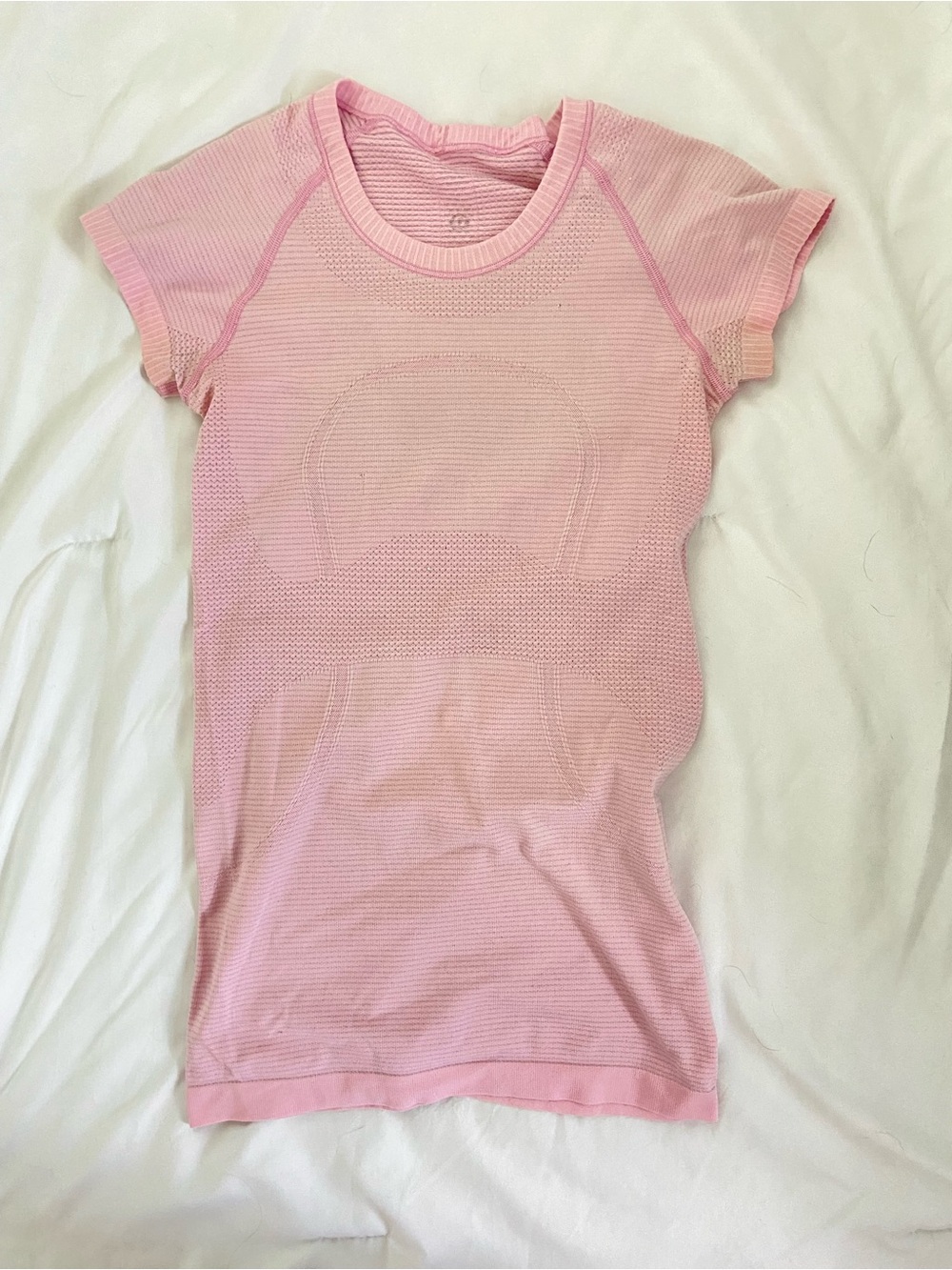 Light pink Lululemon short sleeve swiftly top